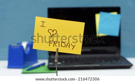 I love friday written on a memo at the office