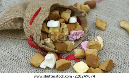 Jute bag with ginger nuts and candies, typical Dutch treat for Sinterklaas on 5 december