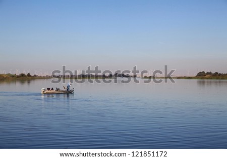 A man on on a fishing boat at Big Break Shoreline Regional Park in Oakley, CA