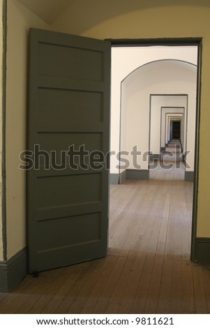 Looking at an open door and down a long hallway in Fort Point