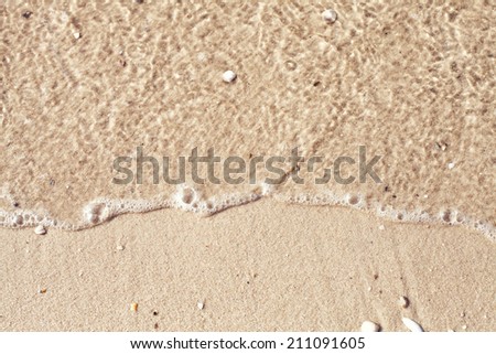 Photo of a beach with beautiful clean sand