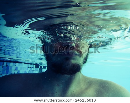 Face with Beard Half Underwater