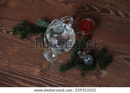 Still-life with red caviar and vodka and fur-tree branches, a New Year\'s still-life