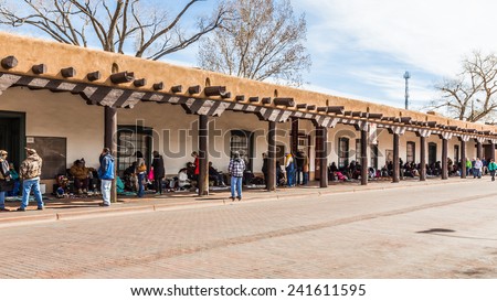 SANTA FE, NEW MEXICO, USA, April, 4, 2014: -  Shoppers and tourists at the Native American market in Santa Fe, New Mexico. The market is held at the Palace of the Governors, built in 1610.