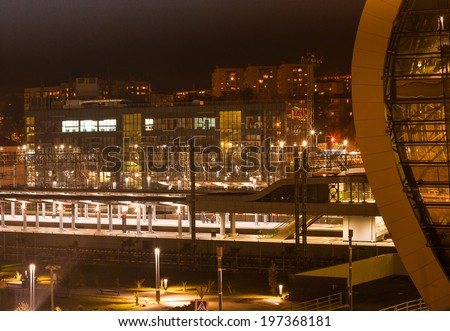Night city Adler on the Black sea In the foreground train station , next town ,