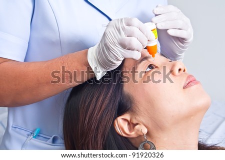 woman sick with eyes drops