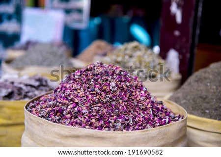 dried herbs flowers spices in Bazaar or souk Khan el-Khalili, and security guard,Cairo, Africa