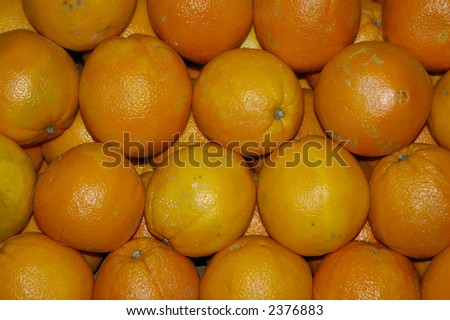 Oranges arranges in a beautiful pattern in a local shop