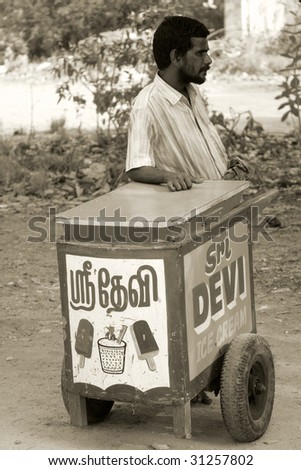 CHENNAI, INDIA - MAY, 3: An ice cream man waiting for customers on May 3, 2009 in Chennai, India