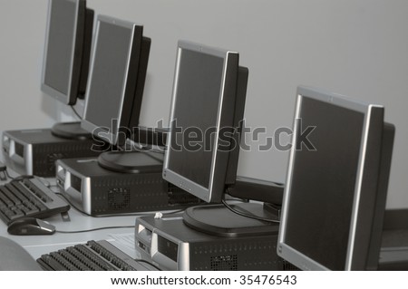 Row of computers set up for training at a classs room