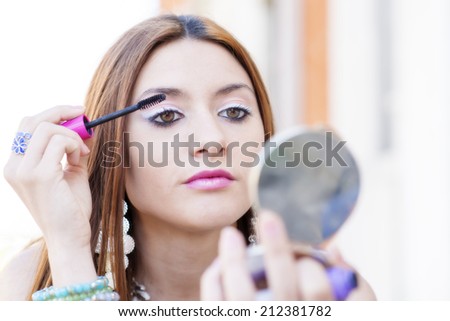 Portrait of beautiful woman makeup lashes.
