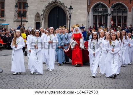 BRUGES, BELGIUM - MAY 17: Annual Procession of the Holy Blood on Ascension Day. Locals perform an historical reenactment and dramatizations of Biblical events. May 17, 2012 in Bruges (Brugge), Belgium