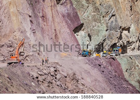LADAKH, INDIA - SEPTEMBER 10, 2011: Road construction in Himalayas. Ladakh, Jammu and Kashmir, India