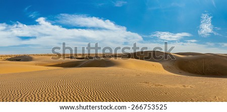Panorama of dunes landscape with dramatic clouds in Thar Desert. Sam Sand dunes, Rajasthan, India