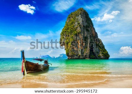 Tropical vacation holiday beach concept - Long tail boat on tropical beach, Krabi, Thailand