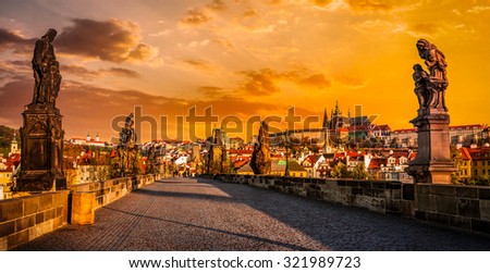 Panorama of Charles bridge with statues and Prague castle on surise. Prague, Czech Republic