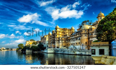 Romantic India luxury tourism wallpaper  - Panorama of Udaipur City Palace and Lake Pichola. Udaipur, Rajasthan, India