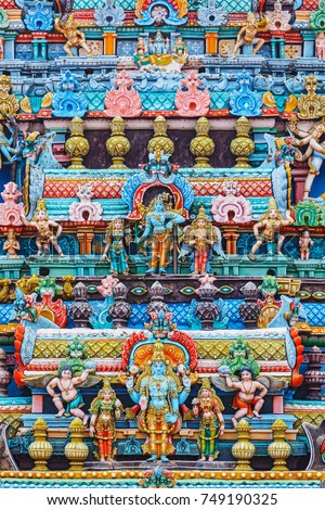 Bas reliefes on gopura (tower) of Hindu temple. Sri Ranganathaswamy Temple. Tiruchirappalli (Trichy), Tamil Nadu, India