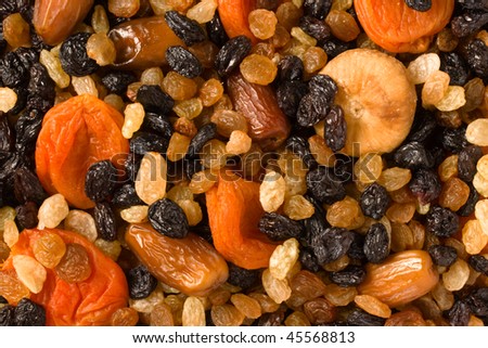 Various dried fruits (apricots, dates, raisins, figs) close-up