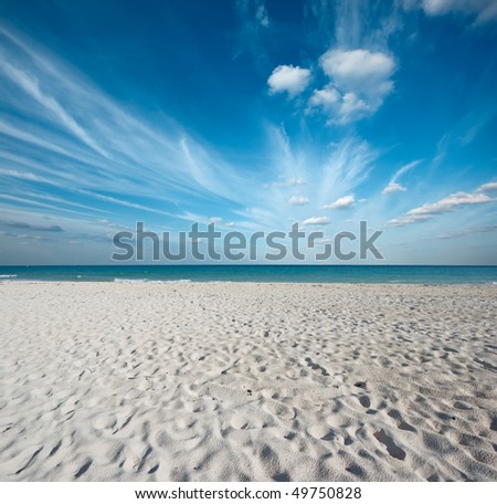 Clean sand beach and blue sky Caribbean Sea. Riviera Maya, Mexico