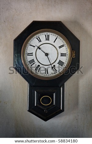Old retro clock on wall