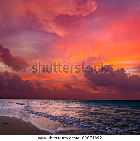 Calm peaceful ocean and beach on tropical sunrise. Bali, Indonesia