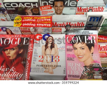 Cologne,Germany- December 17,2012: Popular fashion magazines in german language on display in a store  in Cologne,Germany