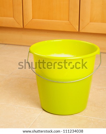 Bucket of water and cloth for cleaning