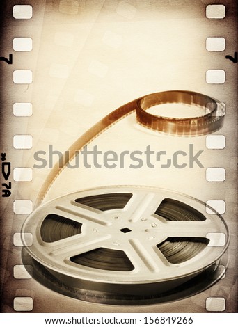 Old Motion Picture Film Reel With Film Strip. Vintage Background