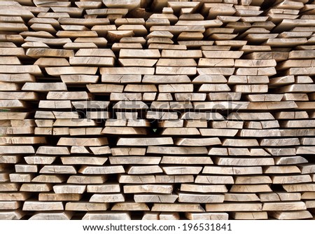 Stack of wood planks for construction buildings and furniture production