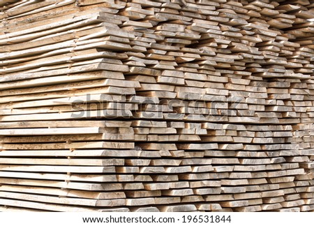 Stack of wood planks for construction buildings and furniture production