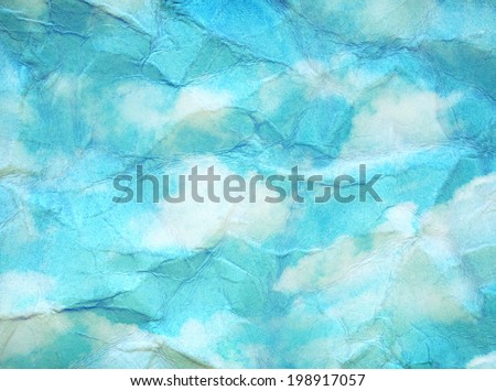 Vintage clouds and sky painted on crumpled paper texture.