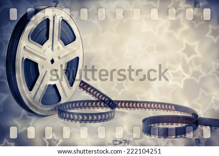 Old motion picture film reel with strip and stars background