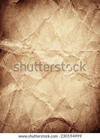 Brown crumpled paper texture in vertical position