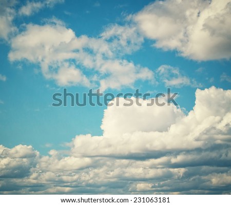 Clouds in blue sky. Sunny time of day.