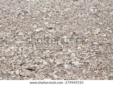 Background of gravel road, gray stone texture