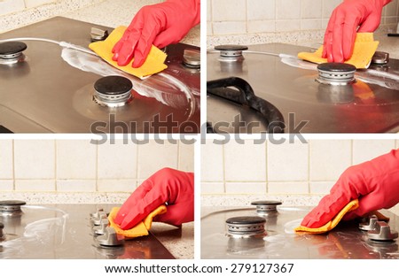 Man heand with red glove cleaning dirty gas stove