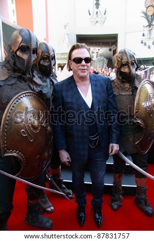 HOLLYWOOD, CA, OCTOBER 31: Actor Mickey Rourke poses with the movie 