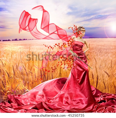 stock photo Beautiful girl in red dress Golden wheat ready for harvest 