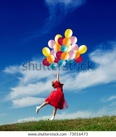 stock photo : Little girl playing with balloons