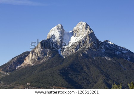 El Pedraforca with snow in winter. Is a Catalonian mythic and magic mountain - pyrenee zone - (Spain)