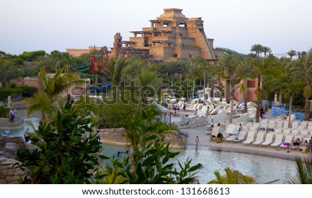 DUBAI, UNITED ARAB EMIRATES - APRIL 20: People and tourists enjoying the rides, slides, sun and water, one of the largest water parks in Dubai on April 20, 2010 in Dubai, United Arab Emirates.