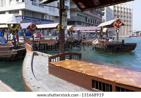 DUBAI, UNITED ARAB EMIRATES - APRIL 13: Typical ferries transporting people from one bank to another of Dubai Creek, quickly and economically. on April 13, 2010 in Dubai, United Arab Emirates.