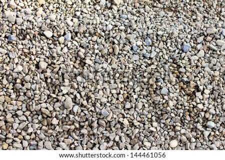 Crushed gravel texture in the road