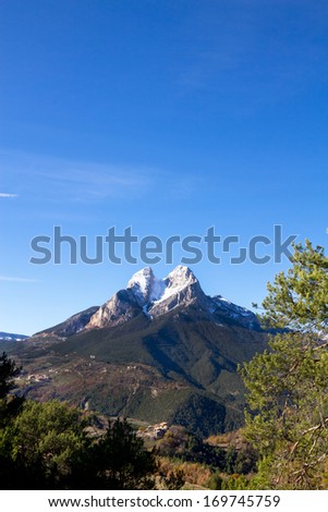 El Pedraforca  with snow in winter. El pedraforca is a Catalonian mythic and magic mountain - pyrenee zone - (Spain)