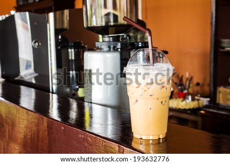 Iced coffee in takeaway cup