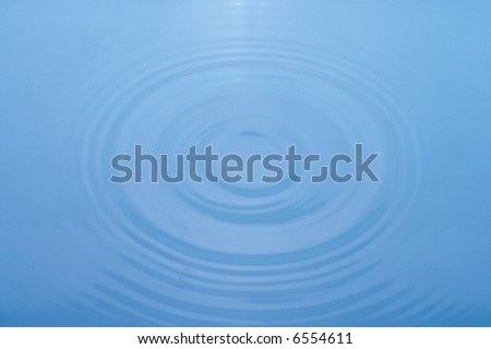 many little water waves on silent water-surface
