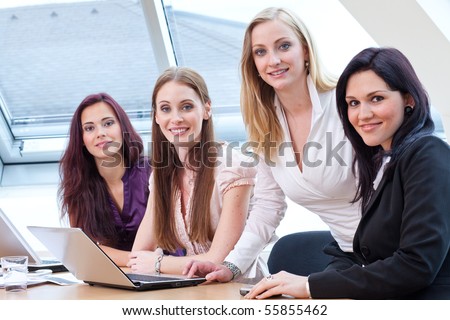 young female boss and employees after done work