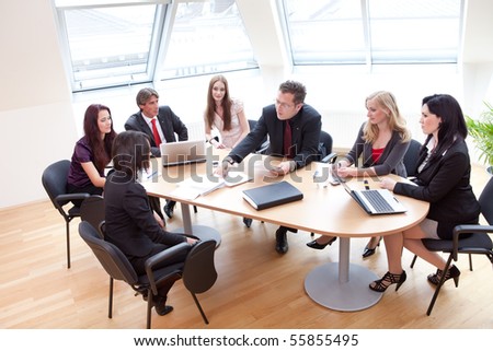 group discussion on a business meeting in a modern office