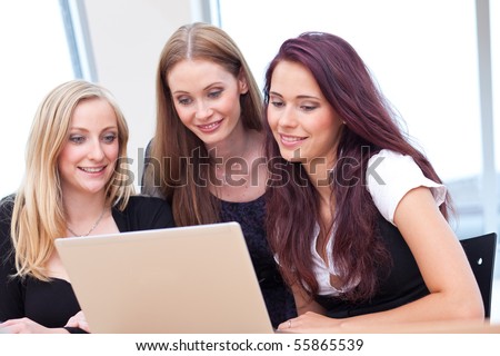 three women surfing in the Internet together
